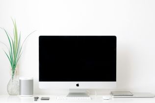 IT-Infrastruktur für eine Chiropraxis – Wie wir ein sicheres Praxisnetzwerk mit Mac mini, iMacs, VPN und Backup-Lösung realisiert haben